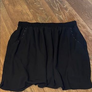 Black stud mini skirt